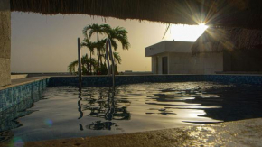 Aldea Zama Loft with pool 10min away from the beach